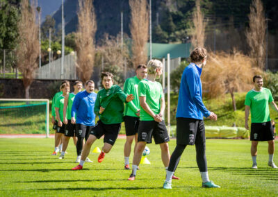 Players doing sports activities at the football camp in Madeira