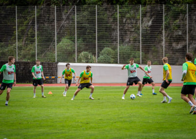 Football team playing a match at the training camp in Madeira