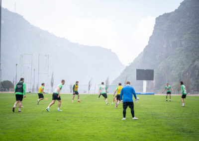 Football field with mountain backdrop at the training camp in Madeira
